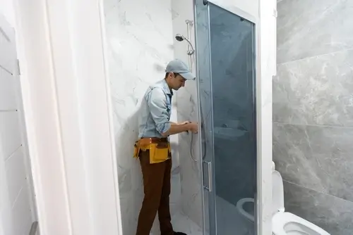 Shower install being completed by Top Builders of Wheat Ridge