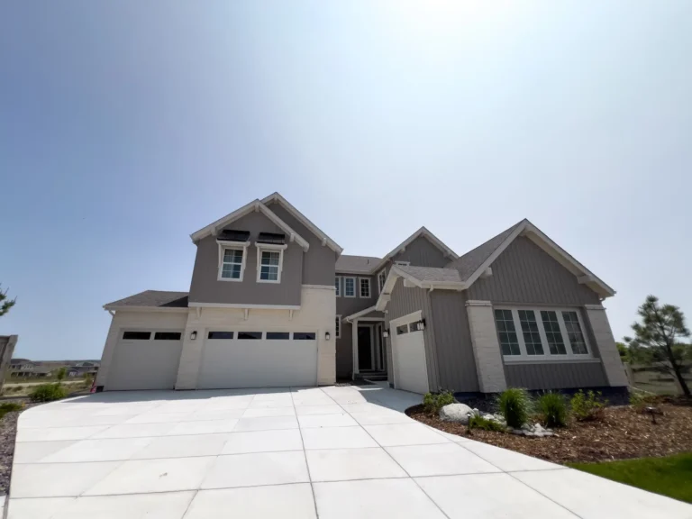 Newly installed concrete driveway outside a residential home in Arvada, Colorado