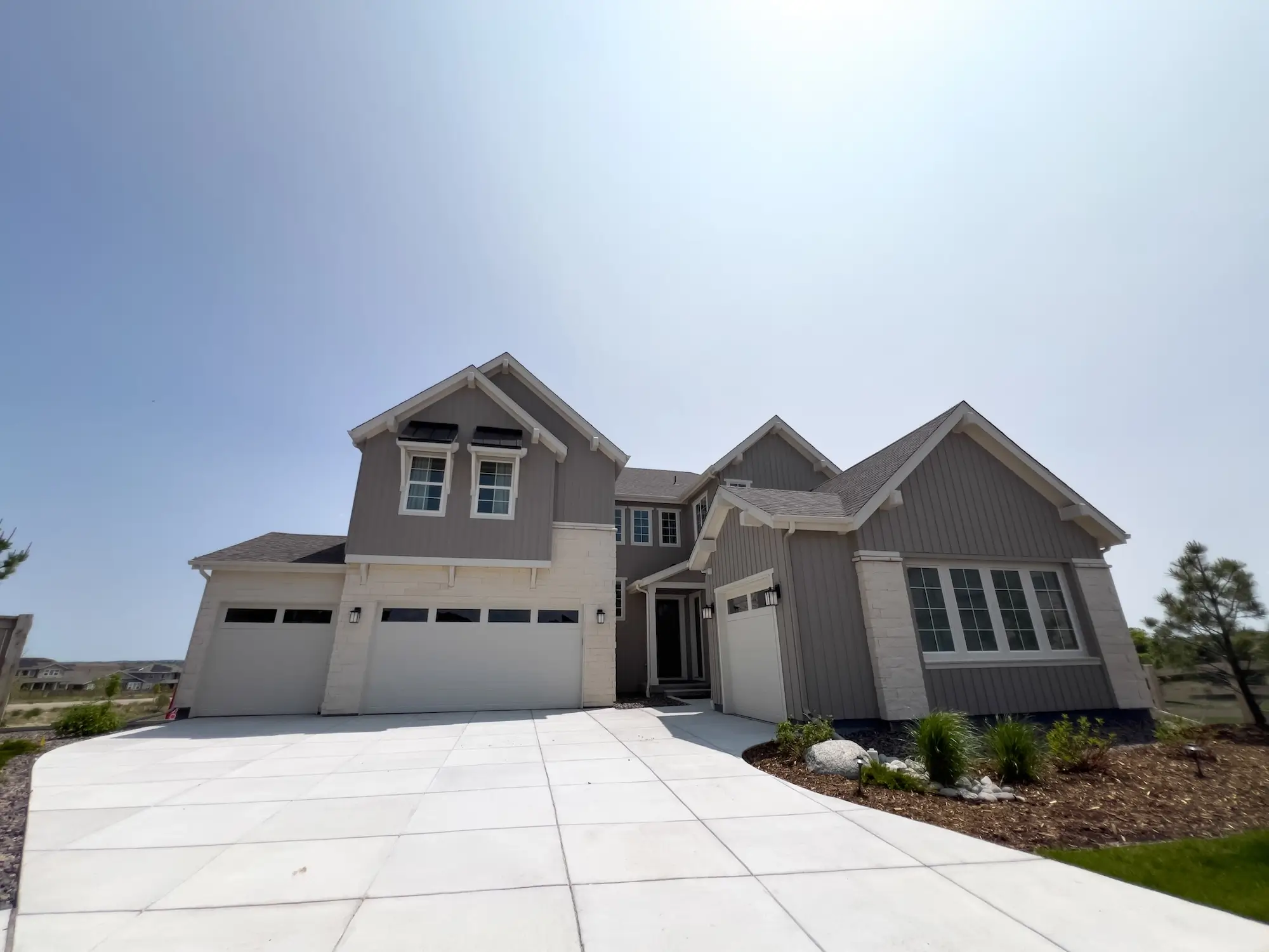 Newly installed concrete driveway outside a residential home in Arvada, Colorado