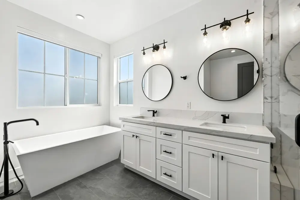 Bathroom remodel with custom vanity cabinets and organized storage solutions